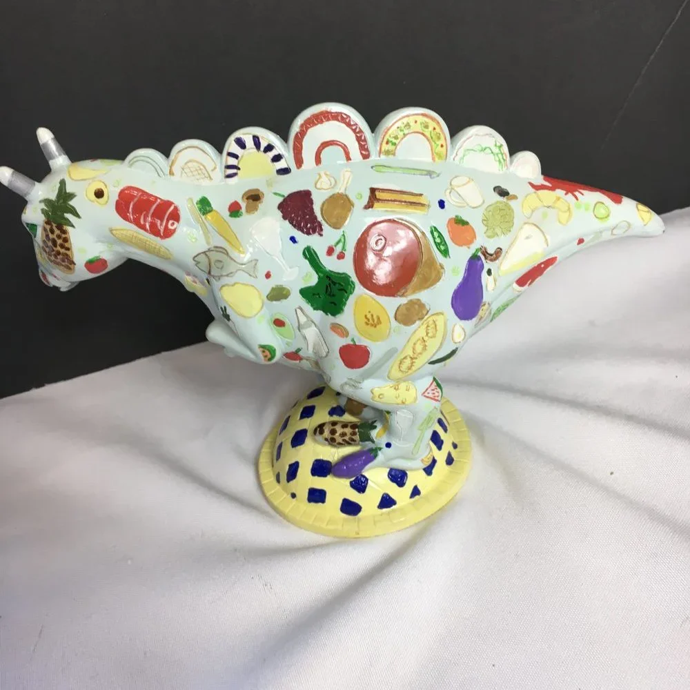 Dinosaur Figure Painted with fish lobster vegetables